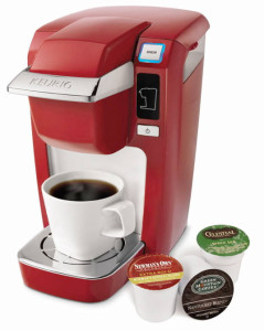 red-Keurig-Coffee-Maker-with-steaming-cup-of-coffee